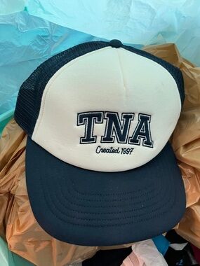 TNA Two-Tone Trucker Hat in Cream and Black
